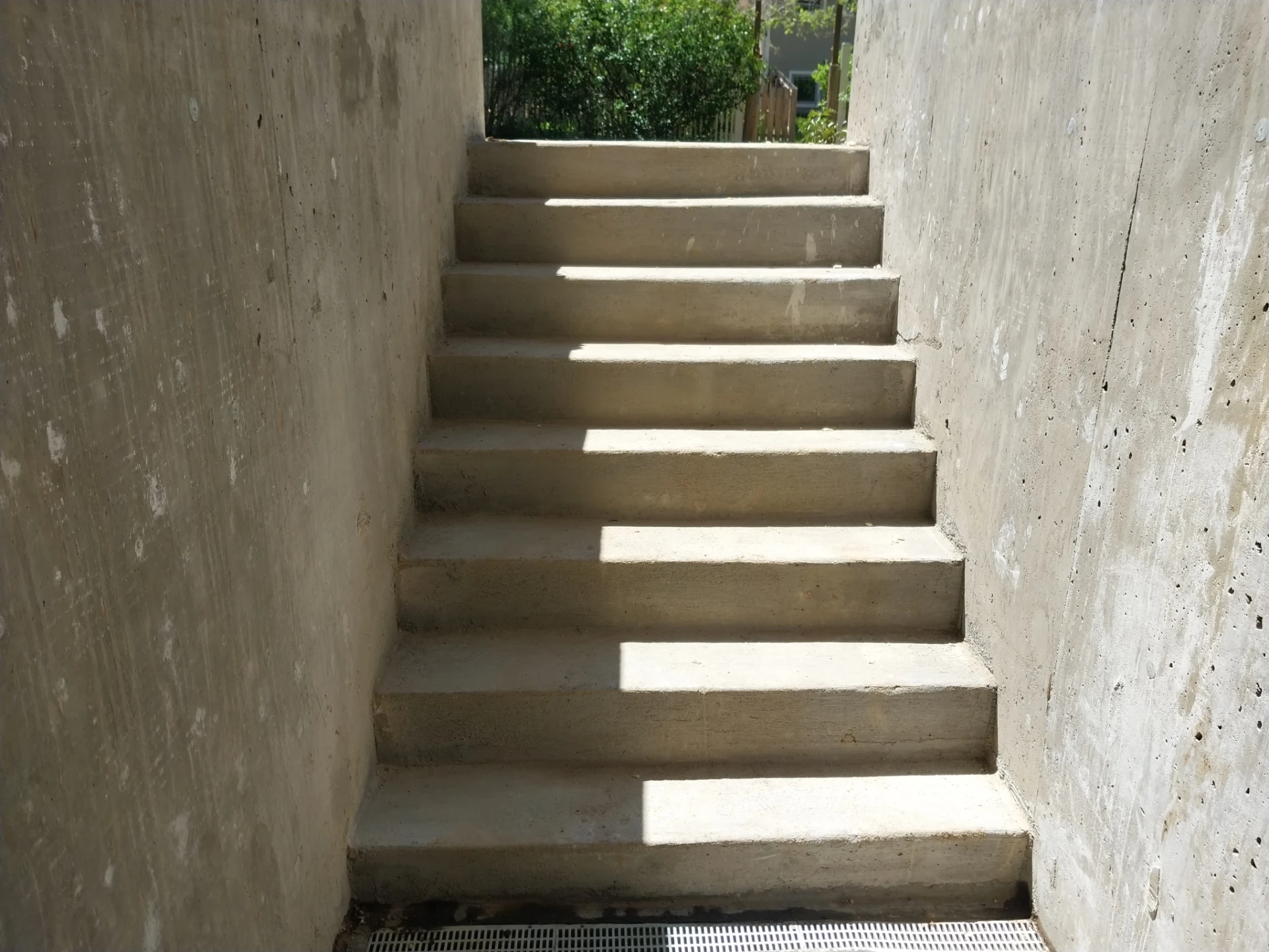 New concrete stairwell built for basement access during crawl space conversion
