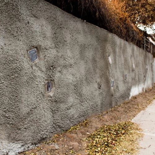 Failing retaining wall requiring professional repair